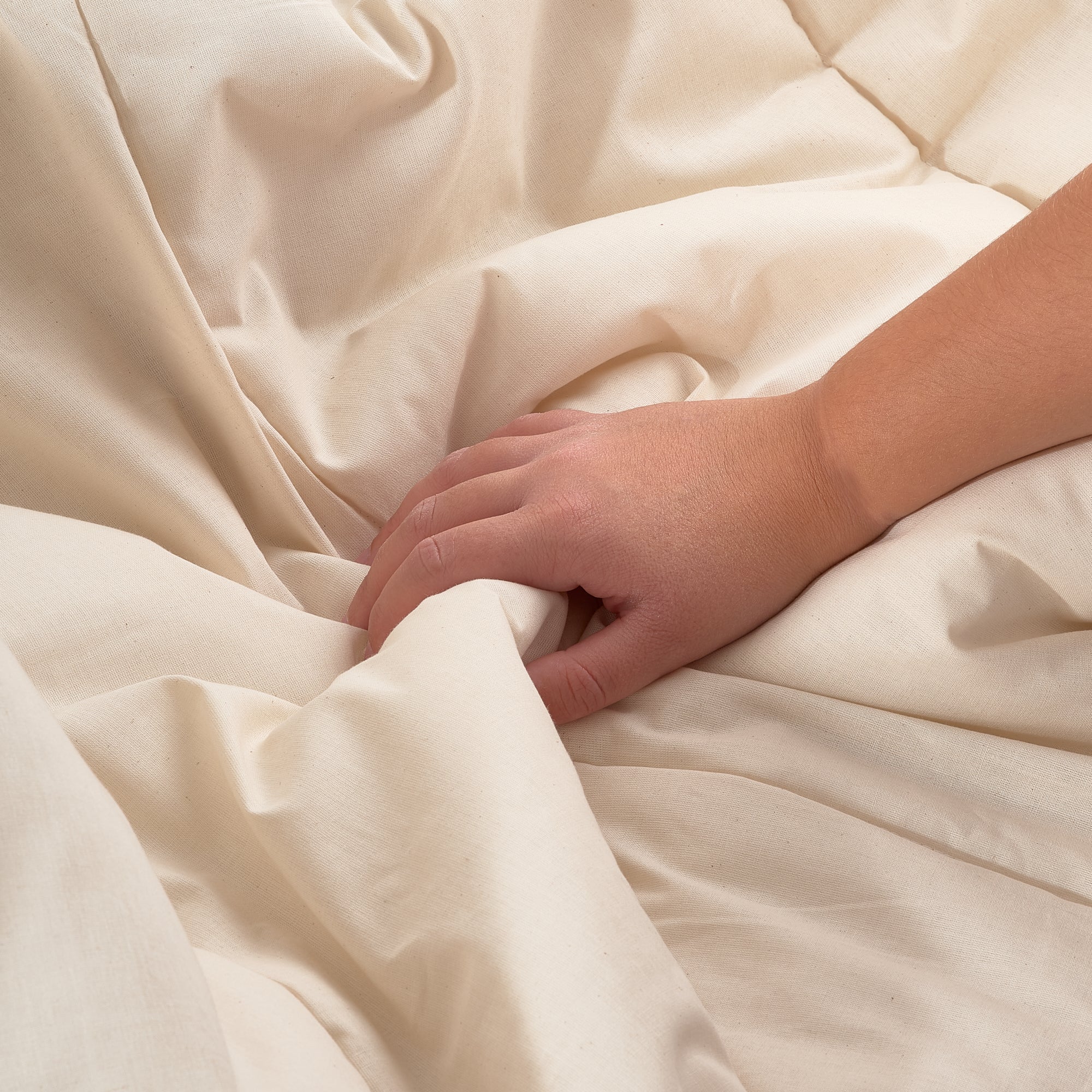 100% cotton Nordic filling with a feather touch of 125 gr.